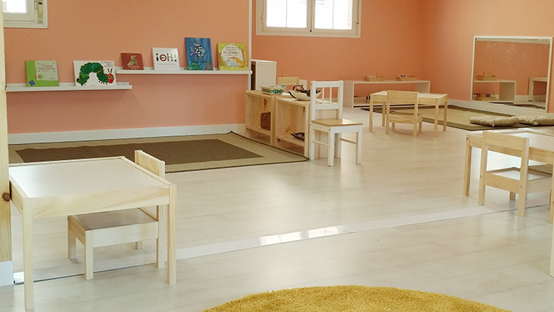 Montessori classroom -even pink walls don't feel overwhelming