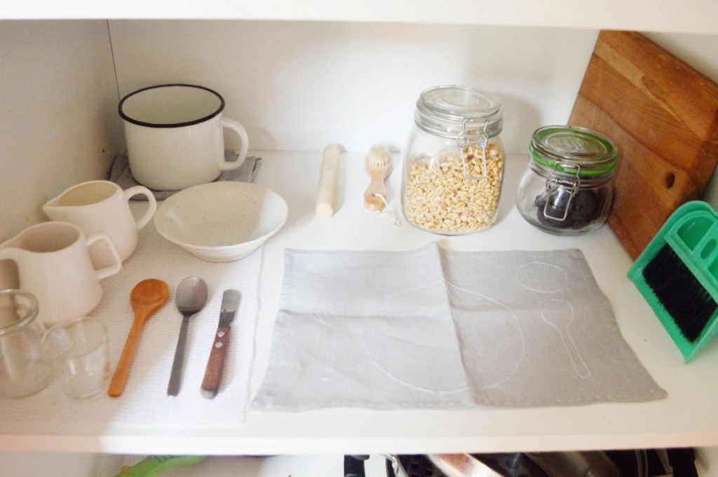 montessori kitchen shelves and place mat